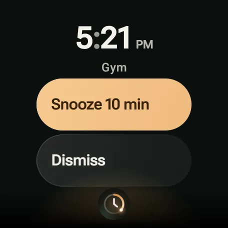 A ringing alarm on the watch with Snooze and Dismiss buttons.